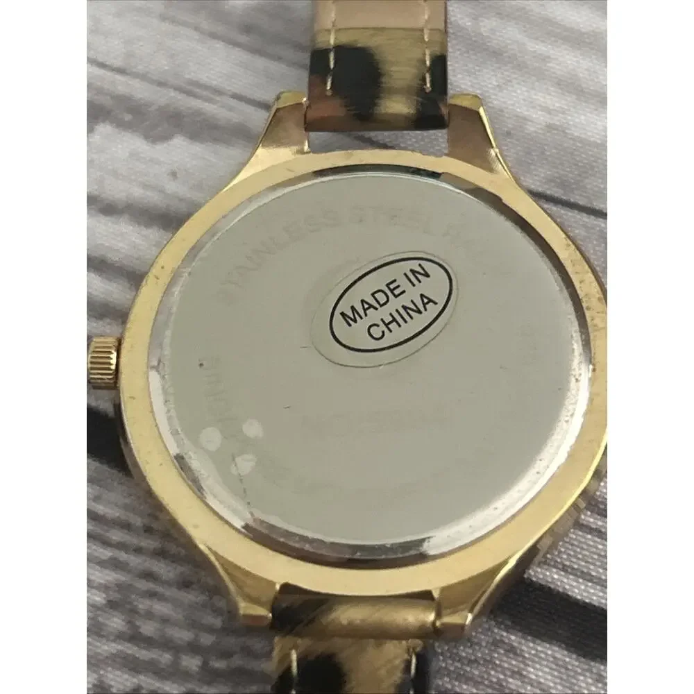 Charming Charlie Gold Tone Cheetah Print Band Women’s Quartz Watch